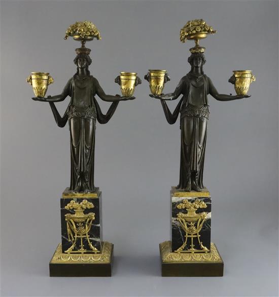 A pair of 19th century French classical revival bronze and ormolu candelabra, H.19in.
